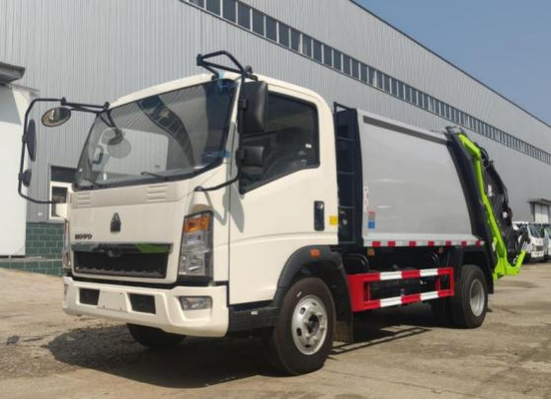 Il ³ di Commercial Vehicles 8m del commerciante del camion che carica il modo HOWO dell'azionamento 4×2 ha compresso il camion di immondizia 7,5 metri di lunghezza
