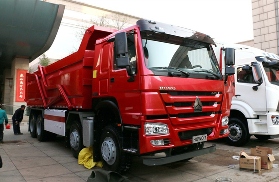 Camion di scarico di gomma usato 8×4 modalità di guida 12 pneumatici trasporto composito HW76 cabina tetto piatto