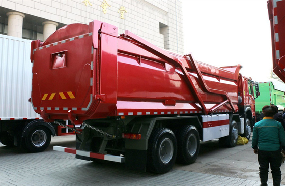 Camion di scarico di gomma usato 8×4 modalità di guida 12 pneumatici trasporto composito HW76 cabina tetto piatto