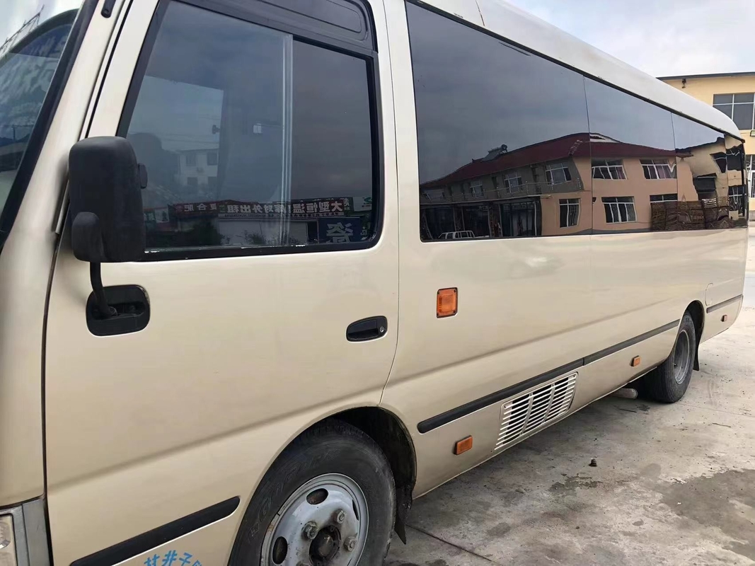 Toyota Mini Used Coaster Bus With ha lasciato a porta del passeggero 23 sedili 1Hz motore diesel