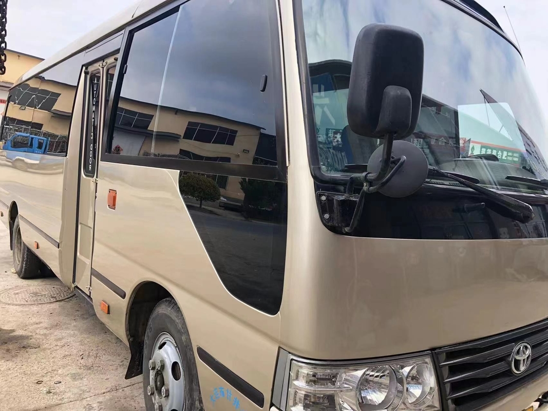 Toyota Mini Used Coaster Bus With ha lasciato a porta del passeggero 23 sedili 1Hz motore diesel