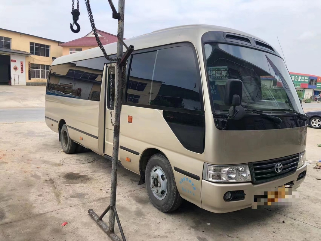 Toyota Mini Used Coaster Bus With ha lasciato a porta del passeggero 23 sedili 1Hz motore diesel