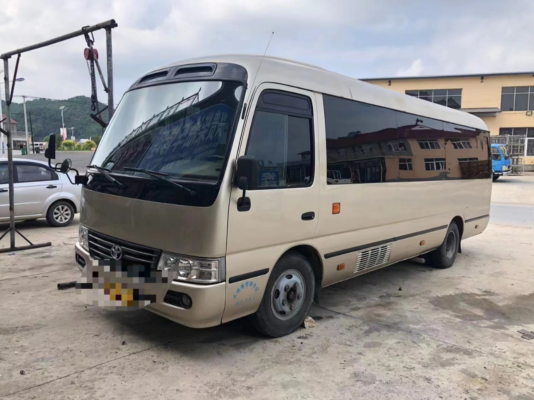 Toyota Mini Used Coaster Bus With ha lasciato a porta del passeggero 23 sedili 1Hz motore diesel