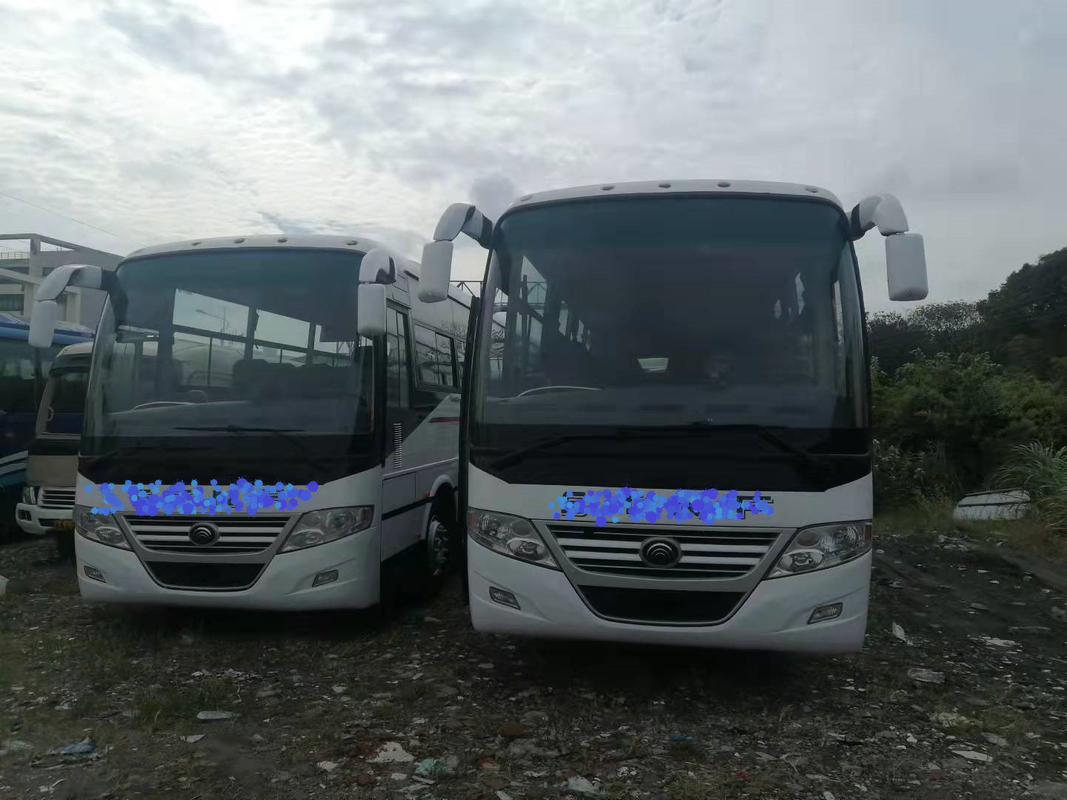 RHD/LHD ha utilizzato la vettura Bus 2+3layout 60seats con la sospensione Yutong ZK6112D della primavera di piatto del paraurti