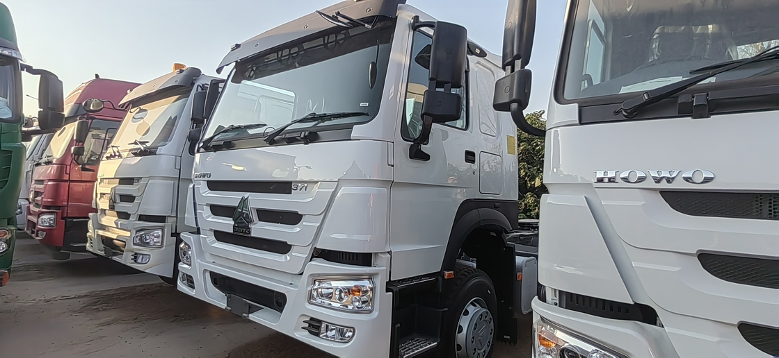 L'autocarro con cassone ribaltabile commerciale utilizzato di HOWO ha utilizzato i camion diesel 6*4 LHD/RHD 371/375hp
