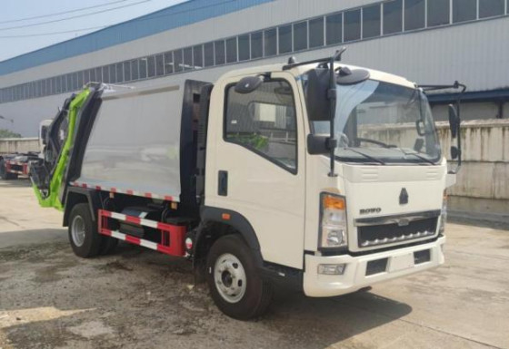 Il ³ di Commercial Vehicles 8m del commerciante del camion che carica il modo HOWO dell'azionamento 4×2 ha compresso il camion di immondizia 7,5 metri di lunghezza