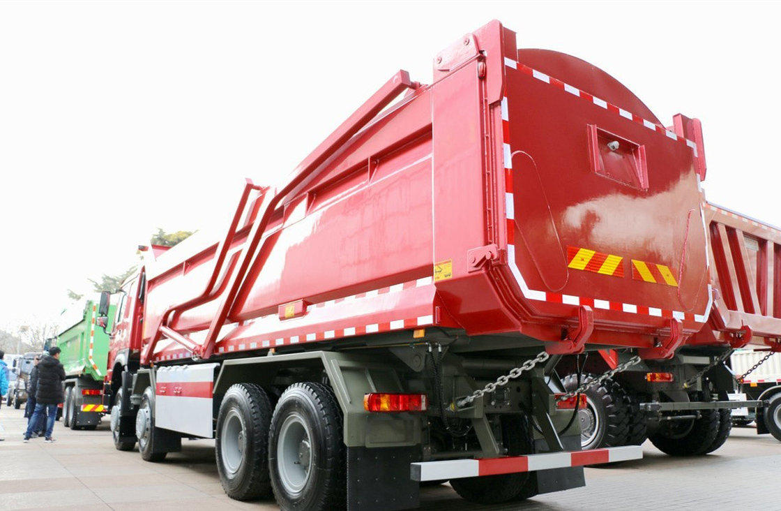 Camion di scarico di gomma usato 8×4 modalità di guida 12 pneumatici trasporto composito HW76 cabina tetto piatto