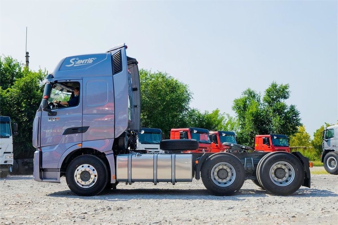 HOWO TH7 Camion 610HP 6*4 AMT Camion automatico per merci pericolose Trattore Camion deflettore di tetto alto