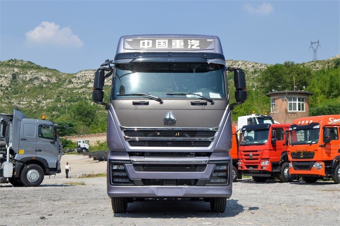 HOWO TH7 Camion 610HP 6*4 AMT Camion automatico per merci pericolose Trattore Camion deflettore di tetto alto
