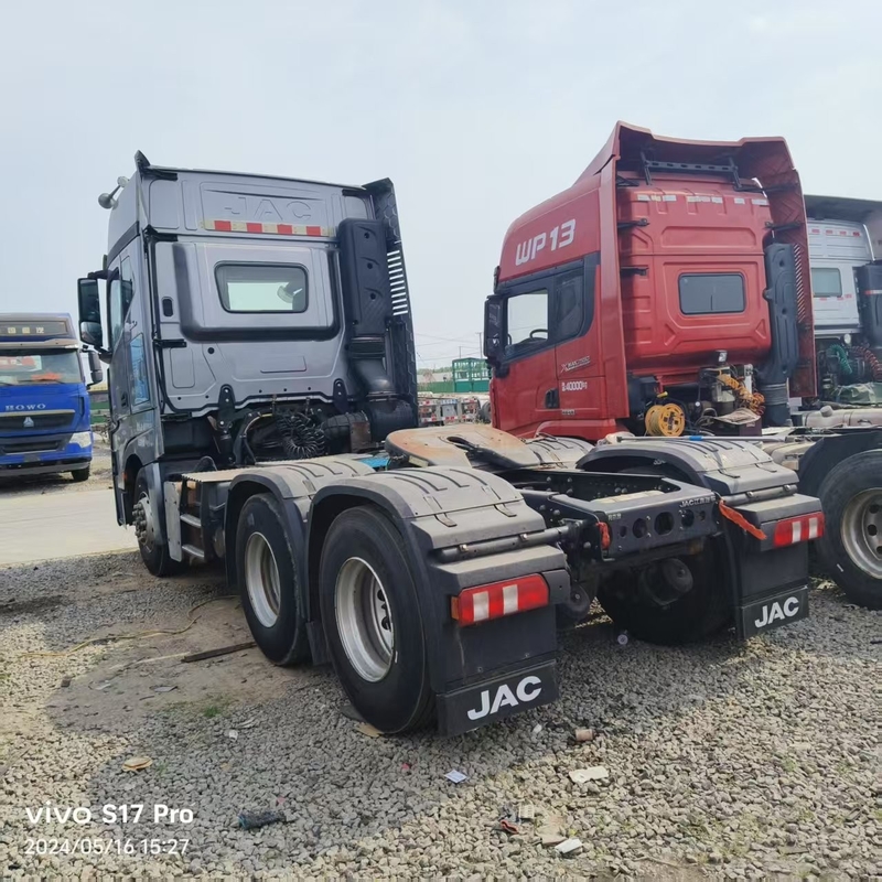 Ingrosso Camion a testa di trattore usato Camion JAC Camion di seconda mano Camion a semiconduttore 540 CV Cabina a tetto alto Trasporto logistico