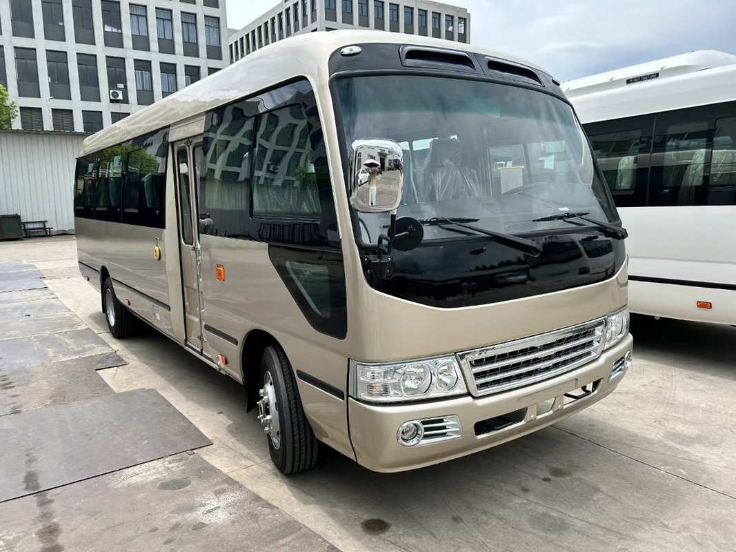 Nuovo Coaster Bus 31 posti Diesel Commercial Business Coach Commuter Shuttle Bus Diesel Cum-Mins Motore