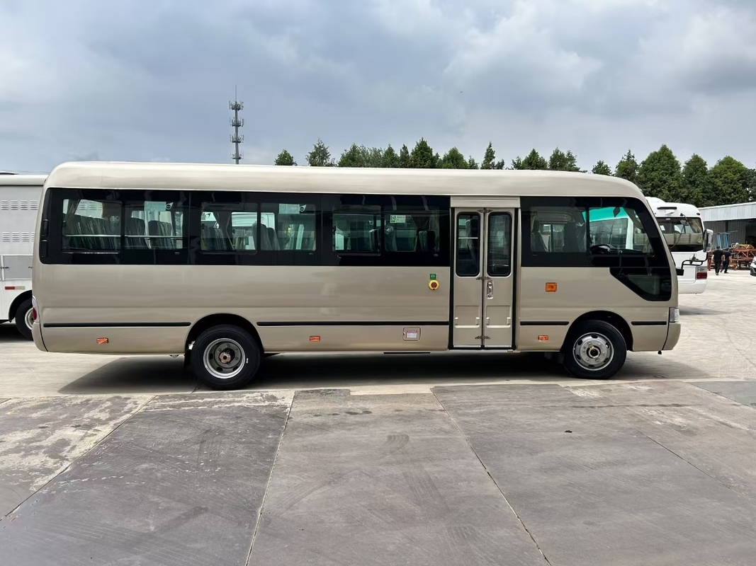 Nuovo Coaster Bus 31 posti Diesel Commercial Business Coach Commuter Shuttle Bus Diesel Cum-Mins Motore