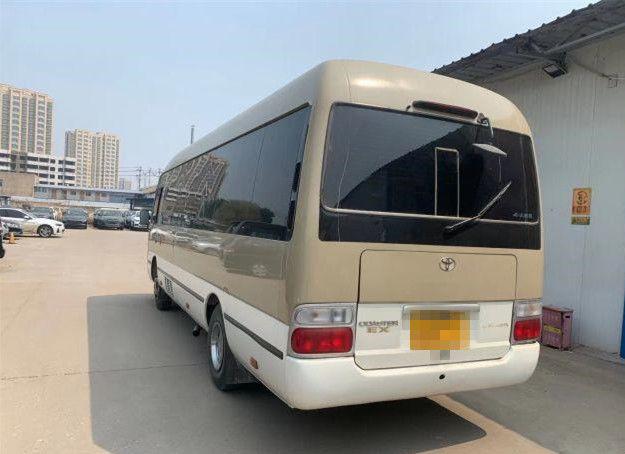 Il bus del sottobicchiere utilizzato 20 sedili ha usato Mini Bus Toyota Coaster Bus con il motore a benzina 2TR direzione della mano sinistra da 2007 anni