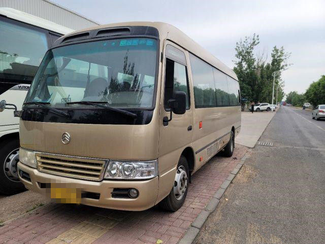 2015 anni 22 Dragon Coaster Bus dorato usato sedili, hanno usato Mini Bus Coaster Bus 86kw con i sedili di lusso