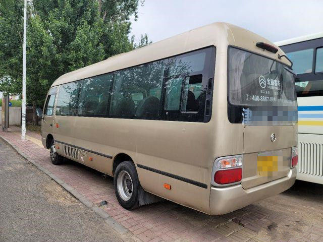 2015 anni 22 Dragon Coaster Bus dorato usato sedili, hanno usato Mini Bus Coaster Bus 86kw con i sedili di lusso