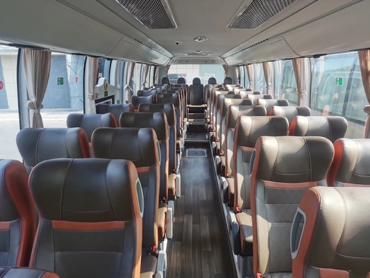 I bus di lusso utilizzati 50 mette la seconda mano a sedere Youngtong ZK6117 dell'erogatore dell'acqua di Champagne Color Middle Passenger Door